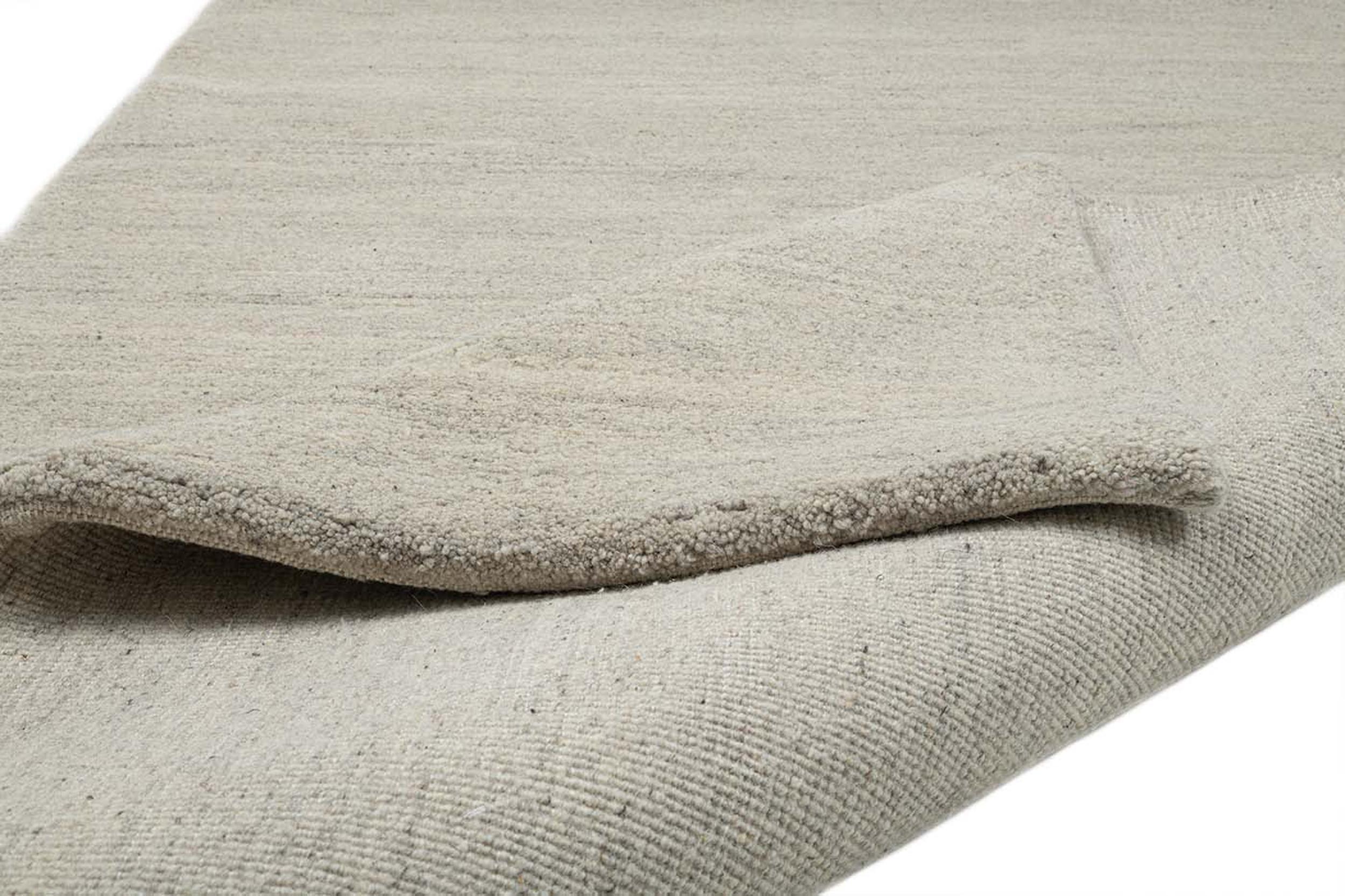 Wohnzimmer Teppich Maloronga Uni 107 Sand aus 100% Schurwolle, in der Farbe Sand | Homerugs - Draufsicht