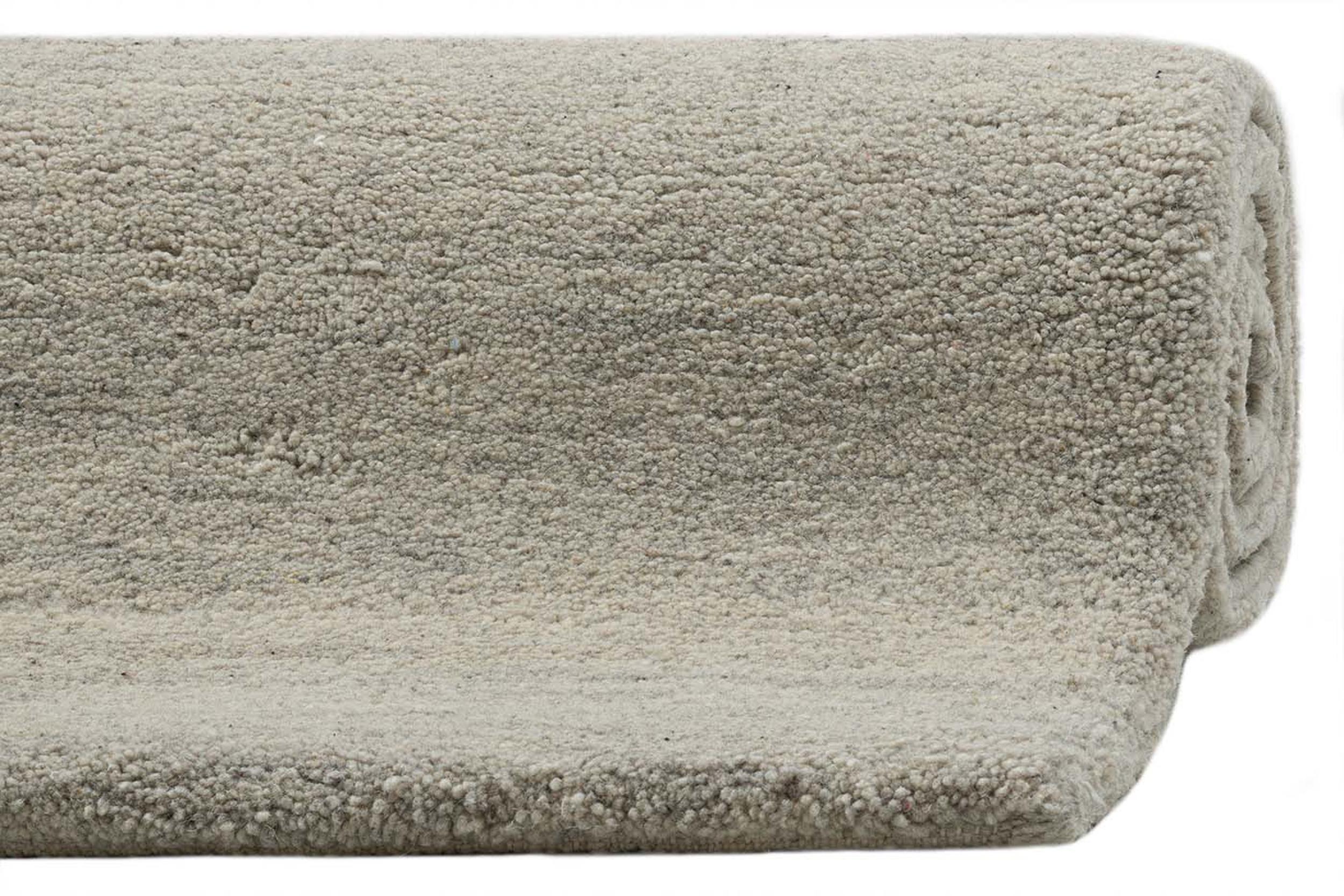 Wohnzimmer Teppich Maloronga Uni 107 Sand aus 100% Schurwolle, in der Farbe Sand | Homerugs - Detailsicht (7)