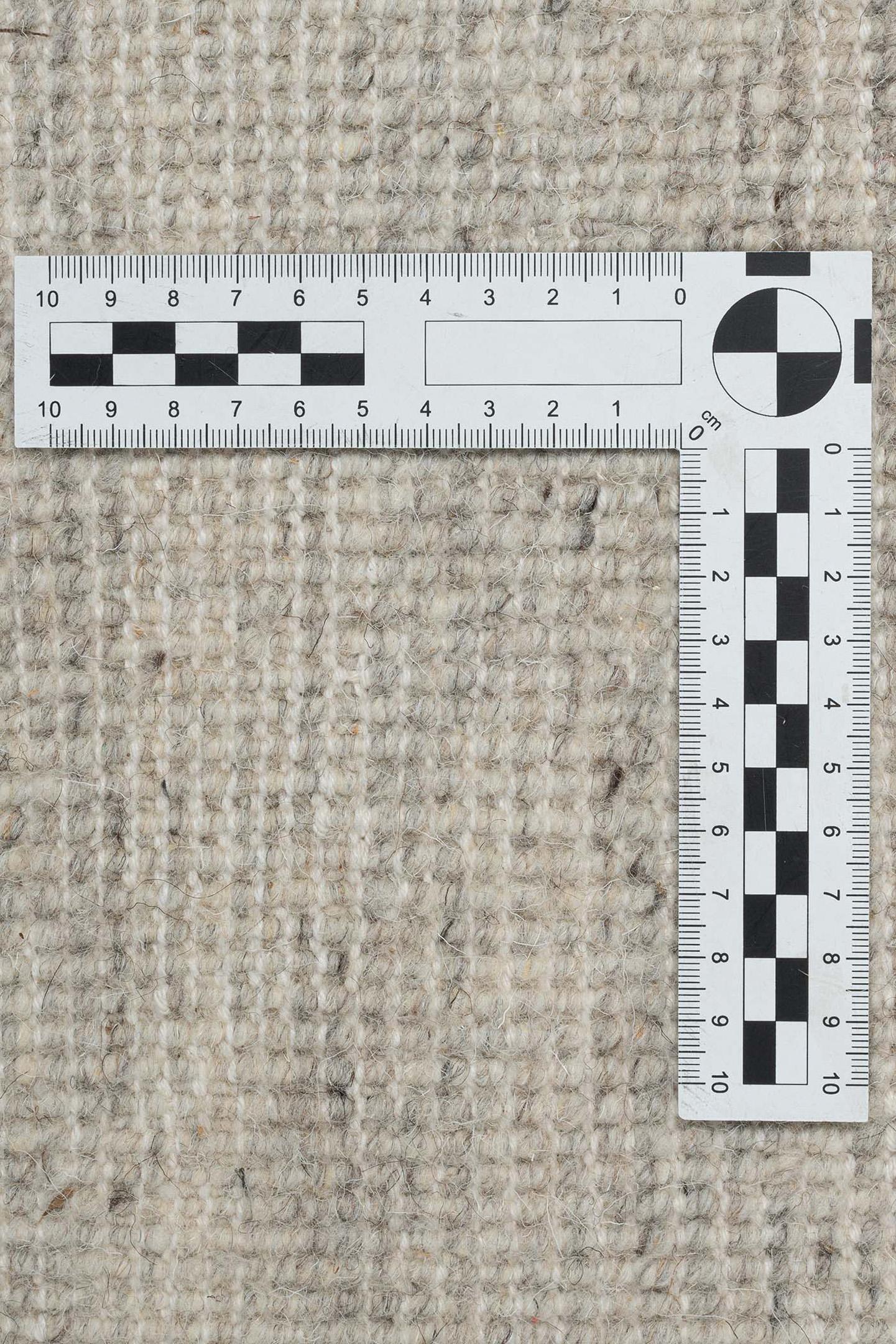 Wohnzimmer Teppich Maloronga Uni 107 Sand aus 100% Schurwolle, in der Farbe Sand | Homerugs - Raumansicht