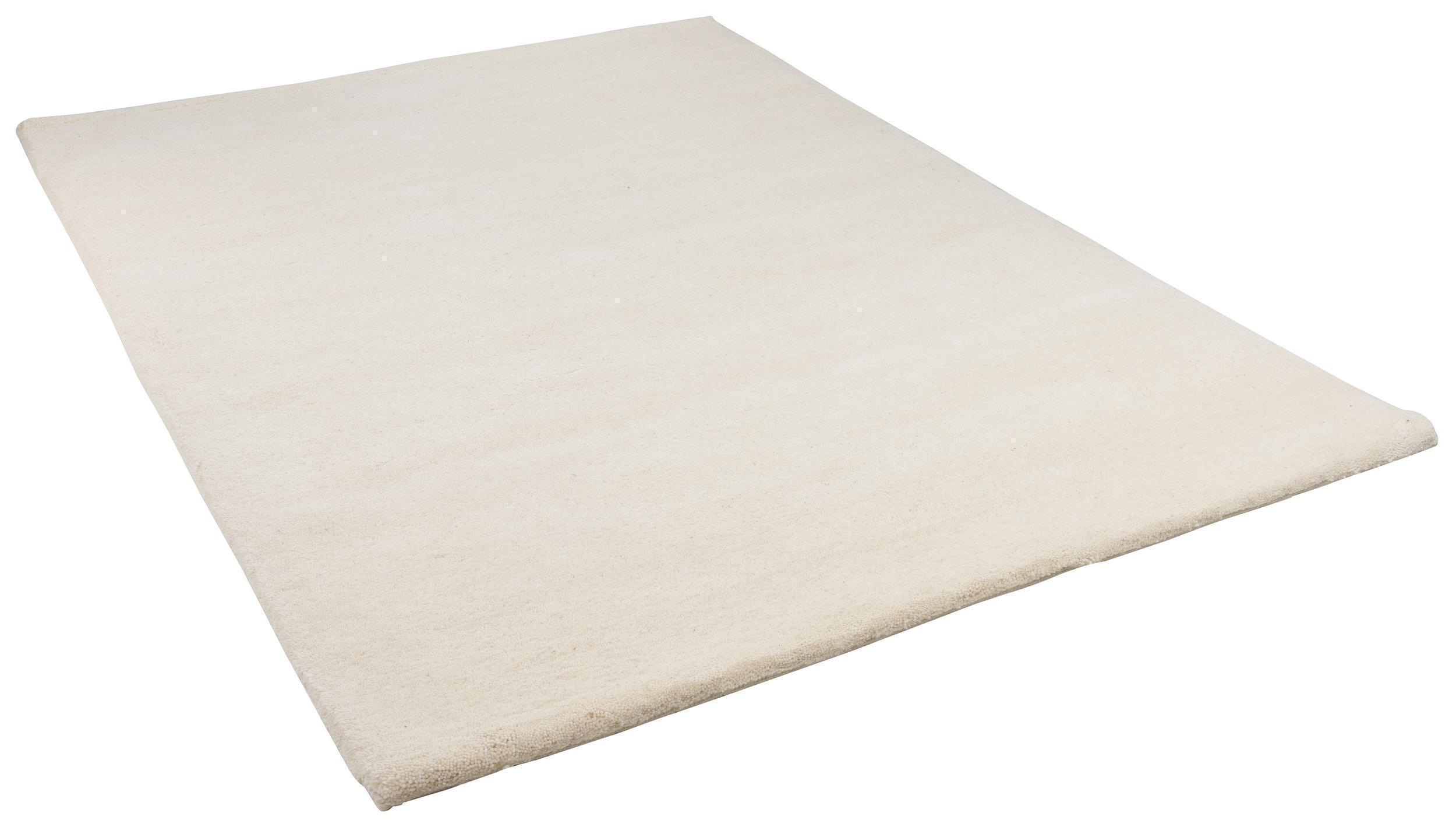 Wohnzimmer Teppich Maloronga Uni 997 Blanc aus 100% Schurwolle, in der Farbe Blanc | Homerugs - Raumansicht