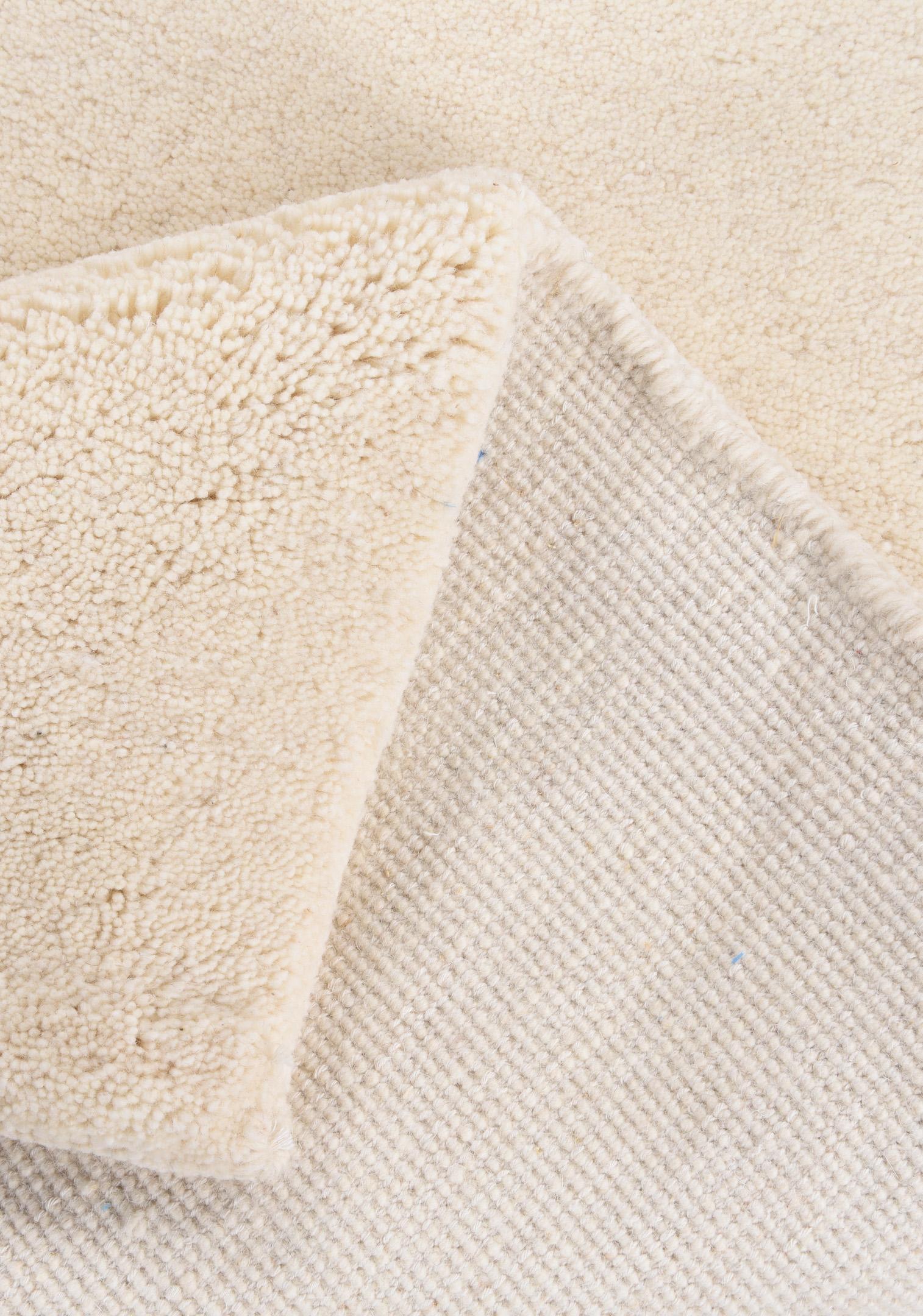 Wohnzimmer Teppich Maloronga Uni 997 Blanc aus 100% Schurwolle, in der Farbe Blanc | Homerugs - Detailsicht (5)